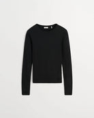 Minimalistyczny, czarny, bawełniany longsleeve Seventies O-neck SKALL z okrągłym dekoltem i wąskimi, długimi rękawami. Posiada przylegający do ciała fason i delikatną, gładką fakturę. Wykonany z organicznej i bardzo przyjemnej dla skóry bawełny. To bluzka idealna do warstwowych stylizacji.&nbsp;

-Przylegający fason

-100% bawełna organiczna

-Zamów longsleeve w swoim normalnym rozmiarze
