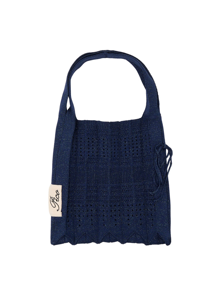 Mała, materiałowa torba Small Rosalia Pico Copenhagen w typie shopper wykonana z wytrzymałej, dzianinowej, plisowanej tkaniny z brokatową, błyszczącą nicią. Uroczy dodatek do codziennych stylizacji. Pomieści najważniejsze rzeczy i niewielkie zakupy.&nbsp;