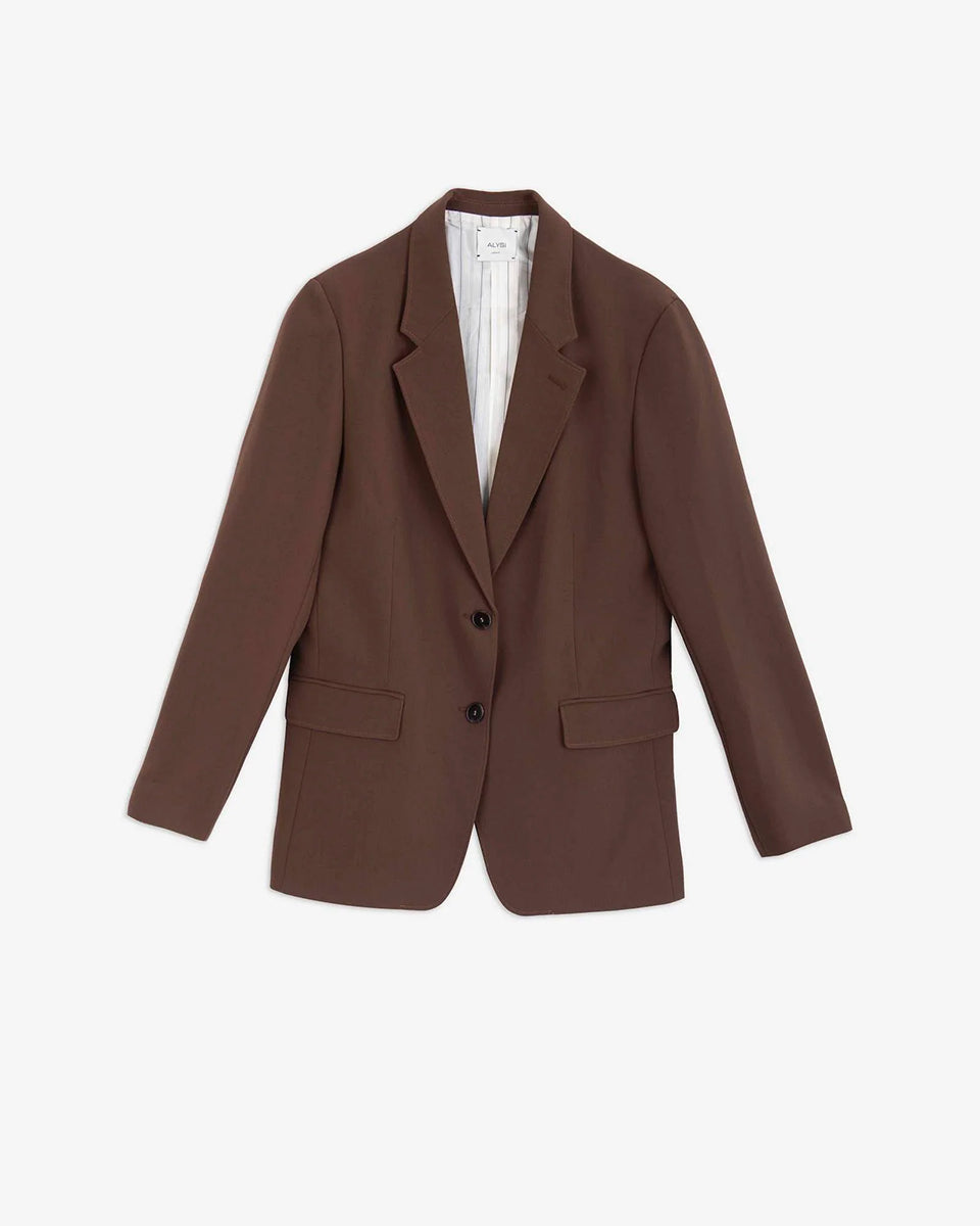 Jednorzędowa, klasyczna marynarka Tailored Wood w brązowym kolorze i prostym kroju. Zapinana na dwa guziki. Marynarka ma klapy i trójkątny dekolt. Posiada dwie, przednie kieszenie z patkami.&nbsp;