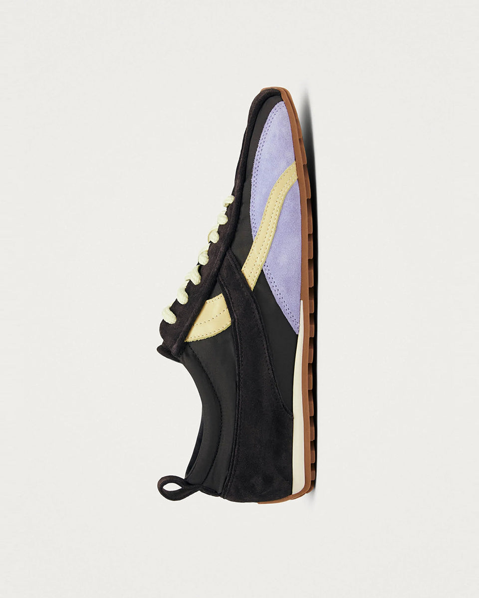 Brązowe, nylonowe sneakersy Tb.304 Nylon Brown marki ALOHAS w stylu retro z liliowymi i delikatnymi, żółtymi akcentami z zamszu oraz skóry. Mają płaską, gumową podeszwę. Długi język i specyficzne przeszycia na czubku optycznie wysmuklają stopę. Wiązane na jasnożółte sznurówki.&nbsp;

-100% skóra pochodząca ze zrównoważonych i odpowiedzialnych źródeł&nbsp;

-Zaprojektowane w Barcelonie&nbsp;