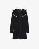 Welurowa, mini sukienka Velvet Black marki GANNI z dużym, zaokrąglonym kołnierzem z kontrastowym, koronkowym obszyciem i długimi, lekko bufiastymi rękawami. Rękawy zakończone są eleganckimi mankietami. Z przodu, na kołnierzu widoczny jest rząd małych, powlekanych materiałem guzików. Sukienka ma swobodny fason, który lekko rozszerza się ku dołowi.&nbsp;

-Zamów sukienkę w swoim standardowym rozmiarze